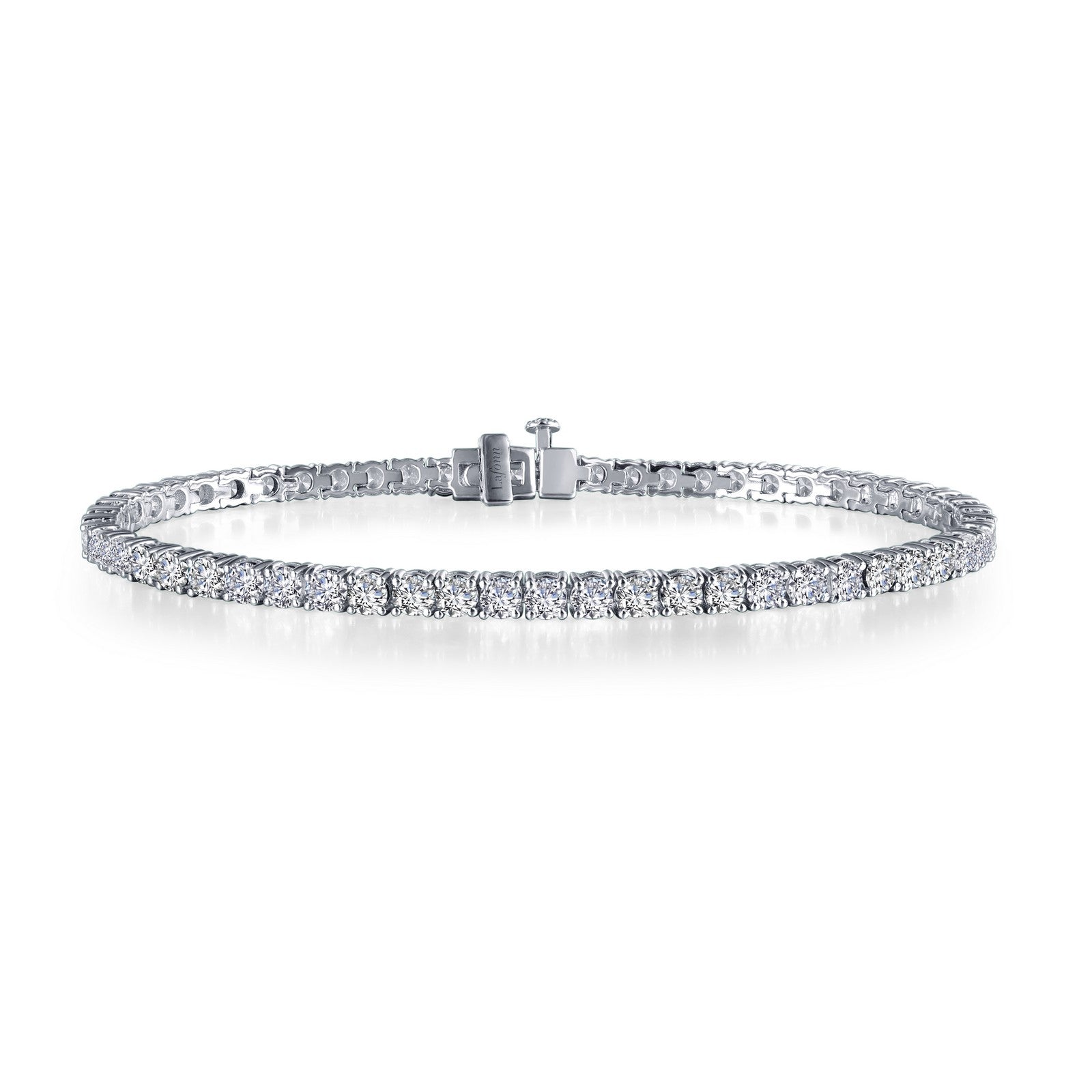 A beautiful Tennis bracelet set in Platinum  bonded sterling silver featuring 59 Simulated Diamonds. 6.5 CTW