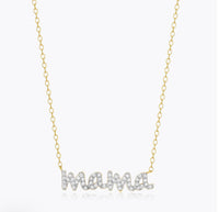 A yellow gold-plated sterling silver necklace with the word 'mama' adorned with brilliant pavé lab-created diamonds.