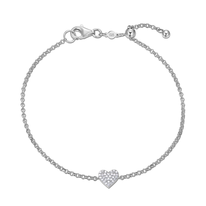 Sterling Silver bracelet with a heart-shaped  pave diamond charm on a white background