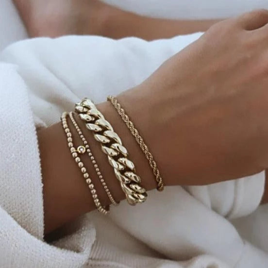 Stack of Alexa Leigh bracelets on Model