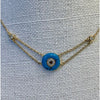 Evil eye pendant 10mm turquoisedisc with white and black Diamonds- on a 14k gold chain   