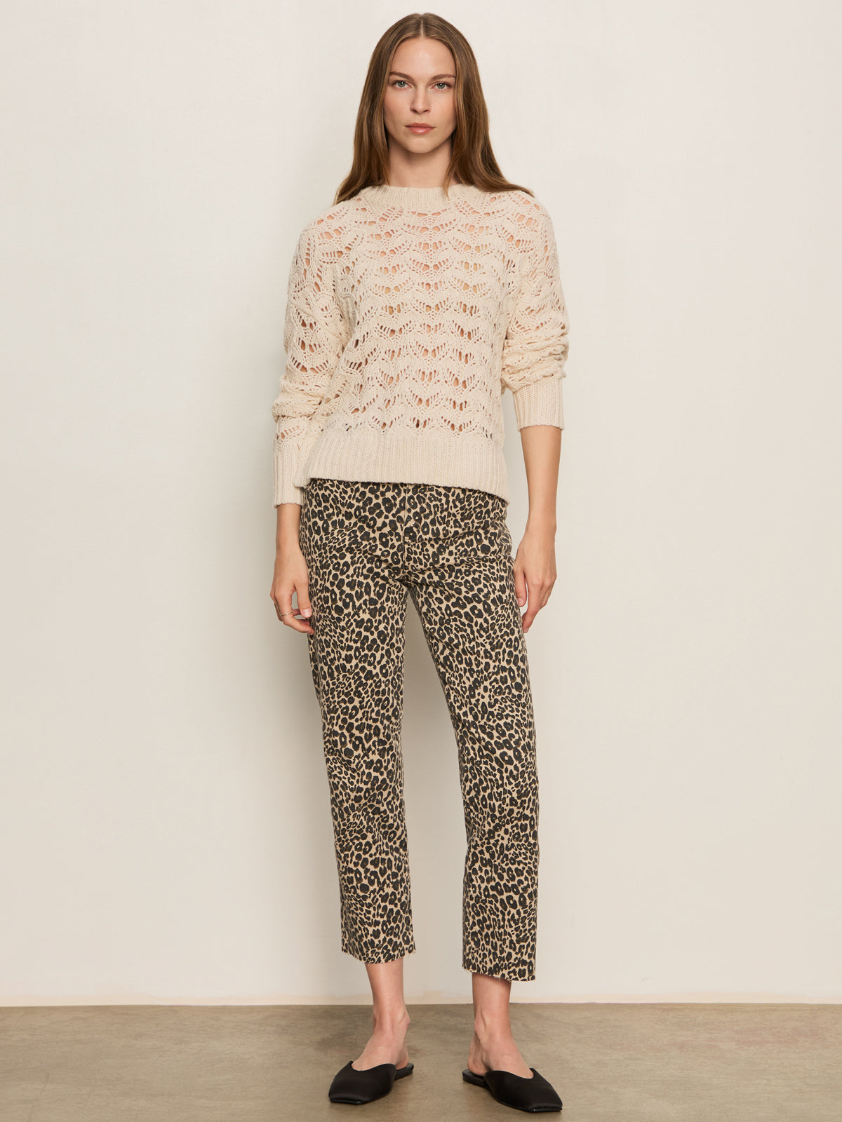 A woman wearing a leopard print mid-rise cropped jean 
