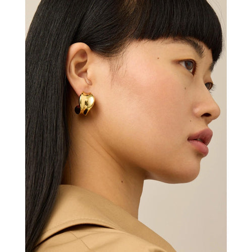 Gold Chunky Doune earrings on model 