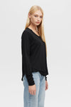 AVA is a black long-sleeve shirt with mock layering at the hemline. 