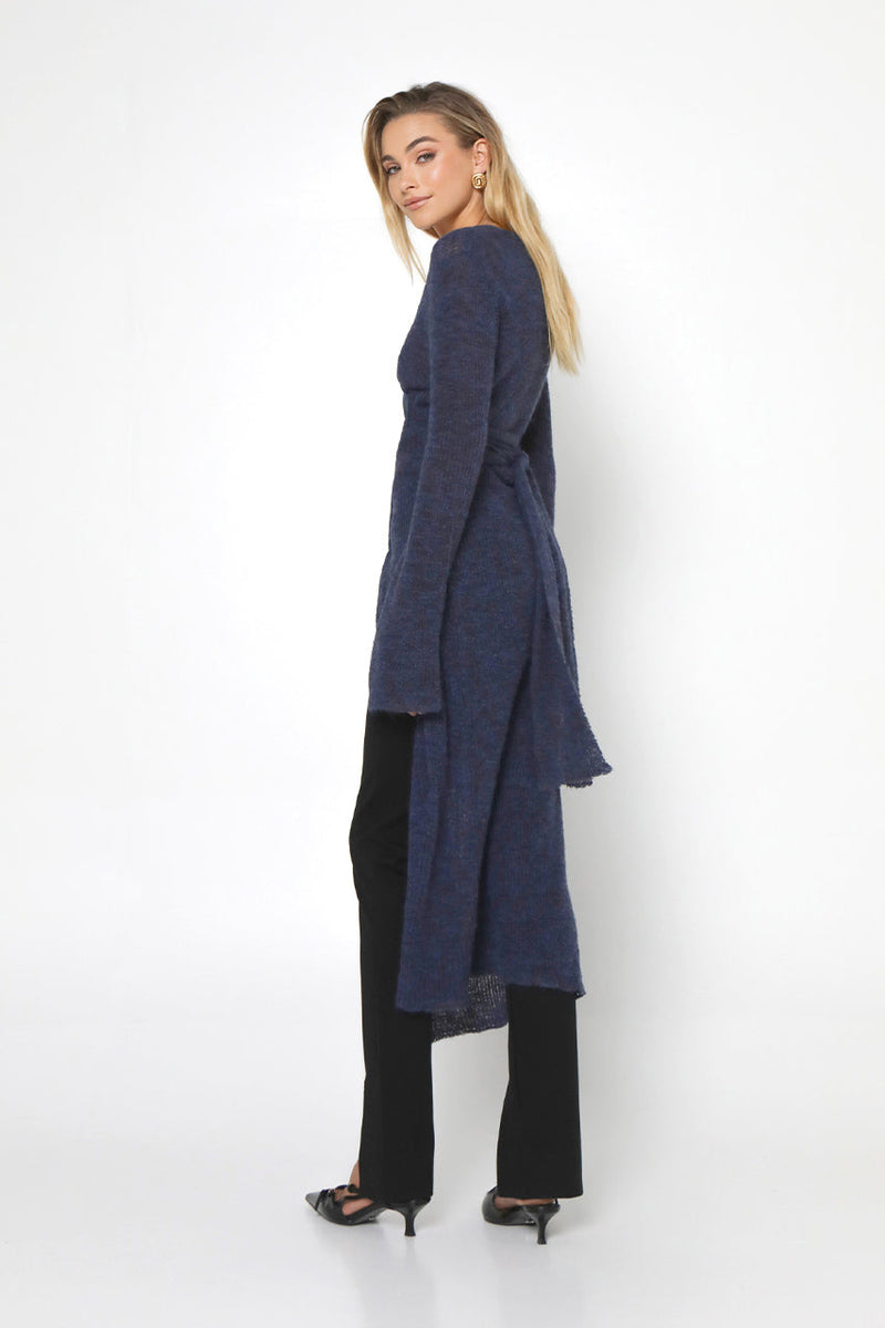 Side view of mid calf length  Ayla Wrap Knit Sweater with tie at waist 