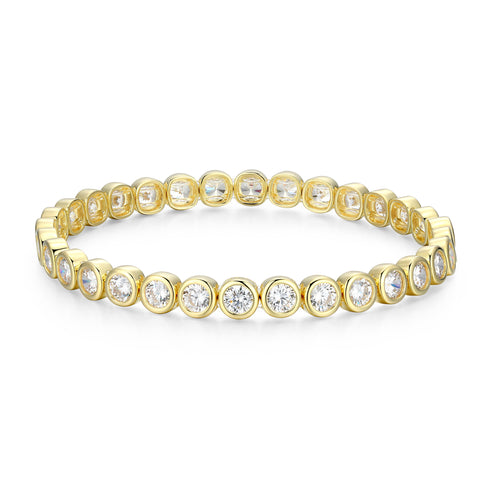 Gold plated sterling silver stretchable  bracelet with bezel set cubic zirconia on a white background