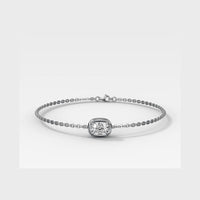 A delicate white gold chain bracelet featuring a central cushion-cut diamond bezel-set in a polished silver frame, displayed on a clean light gray background.