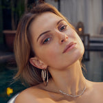 Medium Silver  Ellisse Pianura Earrings on Model by Sif Jakons 