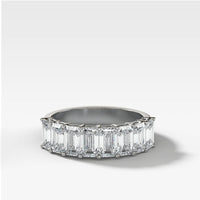 Lab Diamond Eternity band ring with emerald-cut stones on a white background