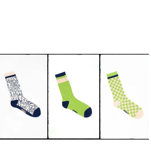 3pairs of socks  in whimsical original graphic  prints in blue and green. 