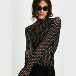 Fitted mesh top with mock neck in a black and white poke  a dot print called Luna Dot - Free People 