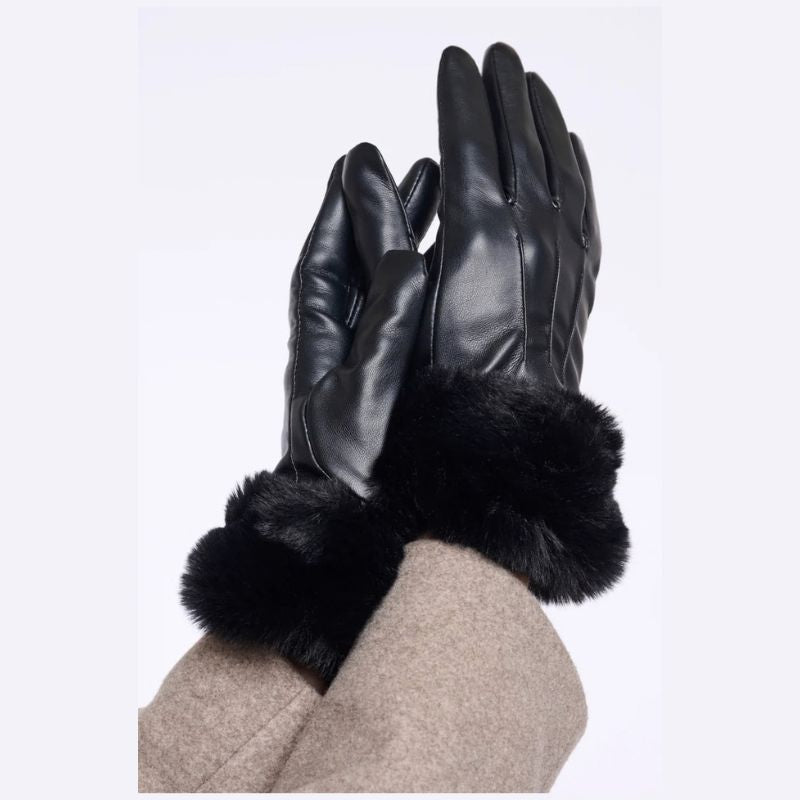 Black leather gloves with fluffy black faux fur trim at the cuffs, shown worn on hands against a plain white background.
