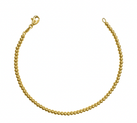 Yellow gold 2.5 mm bead ball bracelet on a white background 
