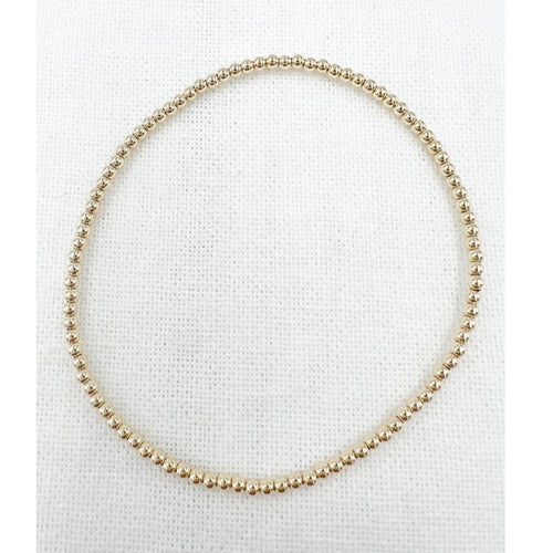 Strechy 2 mm gold bead leave-on bracelet by Saskia de Vries 