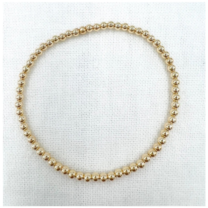 14k gold fil 3 mm bead stretchy bracelet.