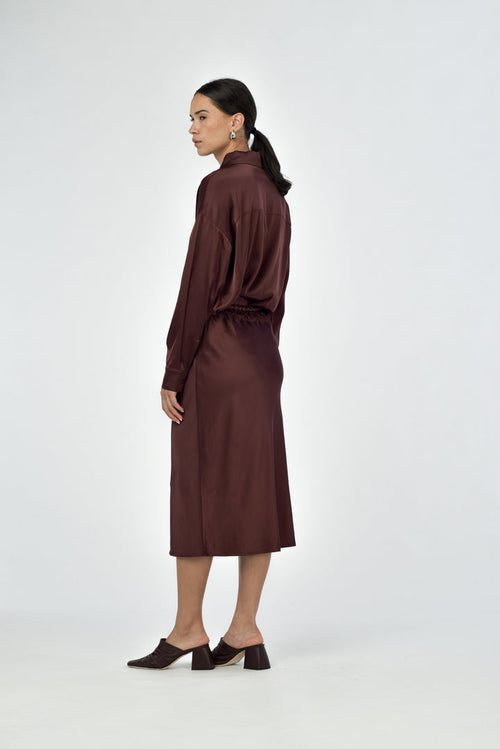 back view of satin slip skirt in truffle brown 