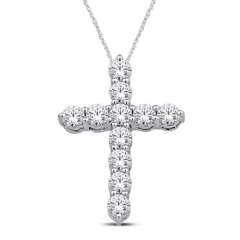 A white gold cross pendant necklace paved with round lab diamonds gemstones, suspended from a delicate white gold chain against a plain white background.