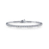 A classic tennis bracelet 2.5 CTW =77 Simulated diamonds set in platinum bonded Sterling Silver.  