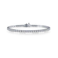 A classic tennis bracelet 2.5 CTW =77 Simulated diamonds set in platinum bonded Sterling Silver.  