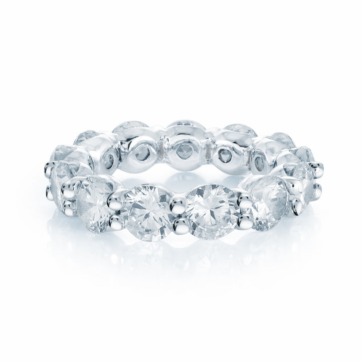 Classic Eternity band with round CZ set in sterling silver on grey background 
