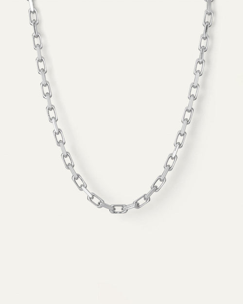 This necklace has a length of 18.8 inches. It is made of silver dipped brass  with a high-polish finish. The necklace has a faceted cable link chain with a foldover clasp.