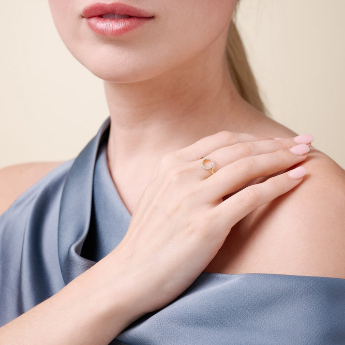 Open circle ring of lab diamond set on a band in  14k gold-plated silver.  