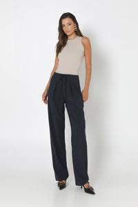 Front view- Wynter Pants with a pleated front and a self tie favric detail - Navy 