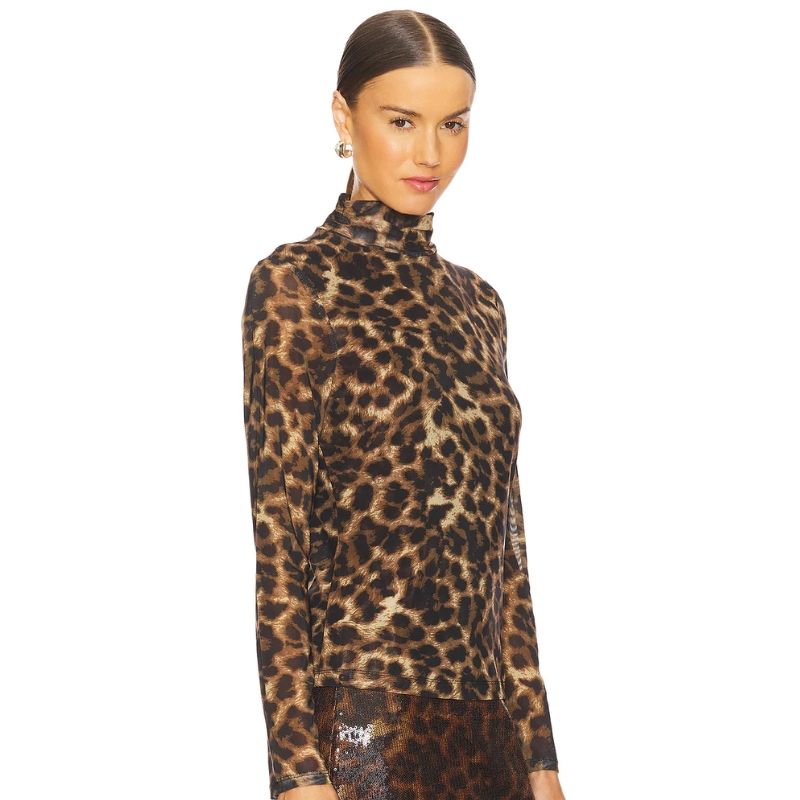 Front view - Long sleeve fitted mock neck top  in a leopard print  mesh fabric. alled Nightspots 