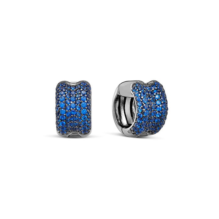 Pair of silver hoop earrings with blue gemstones on a white background