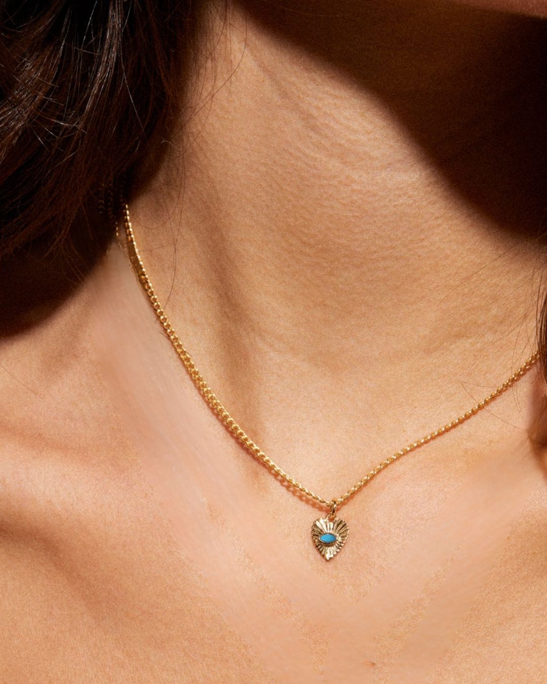 https://hickoxjewelers.com/products/zahava-heirlooms-mini-turquoise-sunbeam-heart-necklace
