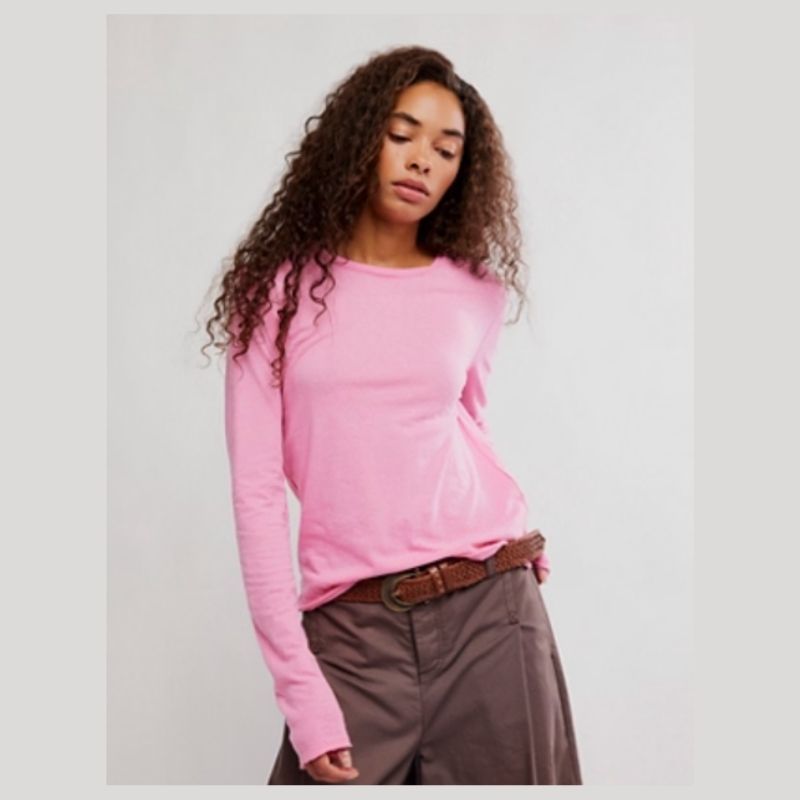 Long Sleeve cotton blend t- shirt with a raw hem  in Pink Carnation  by Free People 