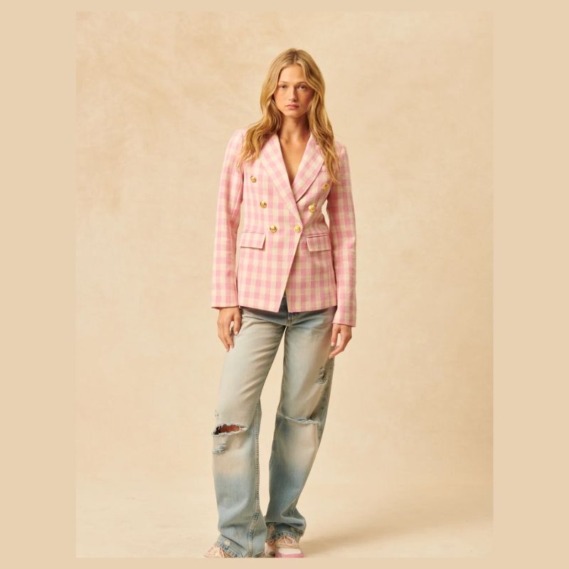 Olivier blazer is a shorter length double breasted blazer with gold tone buttons in a ivory and ballerina pink gingham combo. 