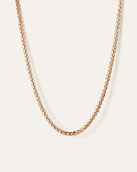 This is a 20" serpentine chain with a foldover clasp. It is made of brass with a high polish finish. 