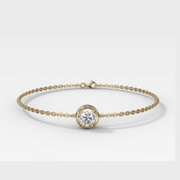 Lab Diamond Single Stone Bezel Bracelet with Round Cut Diamond set in yellow gold. 
