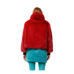 The sawyer cropped jacket in red faux fur by FREED Canada - Back view showing length hits at the bottom of waist. 