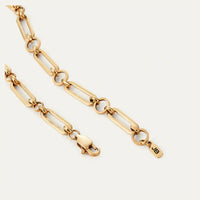 Showing the gold lobster clasp on the Mercer anklet 