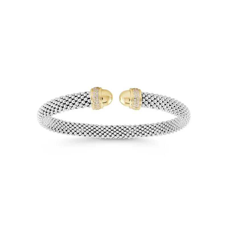 A silver-toned beaded cable bracelet with gold-toned screw-end closures, each accented with a row of small clear stones, shown on a plain white background.