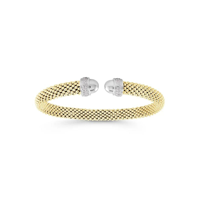 A two-tone mesh bracelet featuring a yellow gold body and silver-toned end caps set with small clear stones, shown on a plain white background.