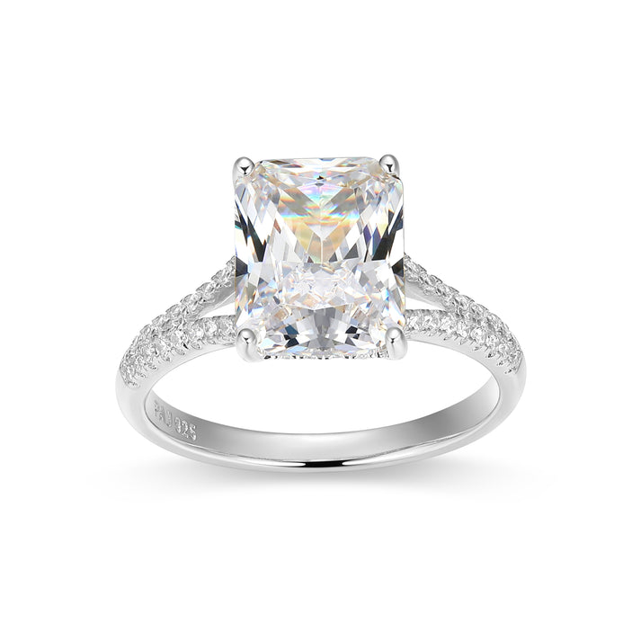 Silver ring with a large diamond on a white background