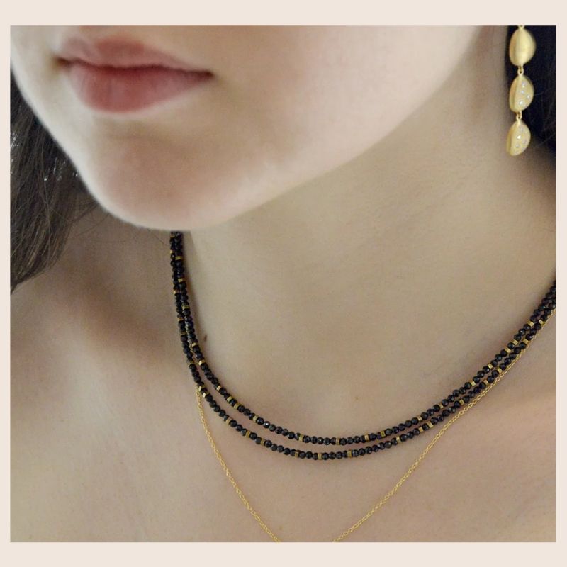 Model wearing Spinel Wrapas a  Necklace