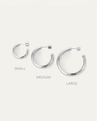 Shows the 3 sizes of basi Silver tone Hoop Earrings by Jenny Bird.
Small, Medium, Large, 