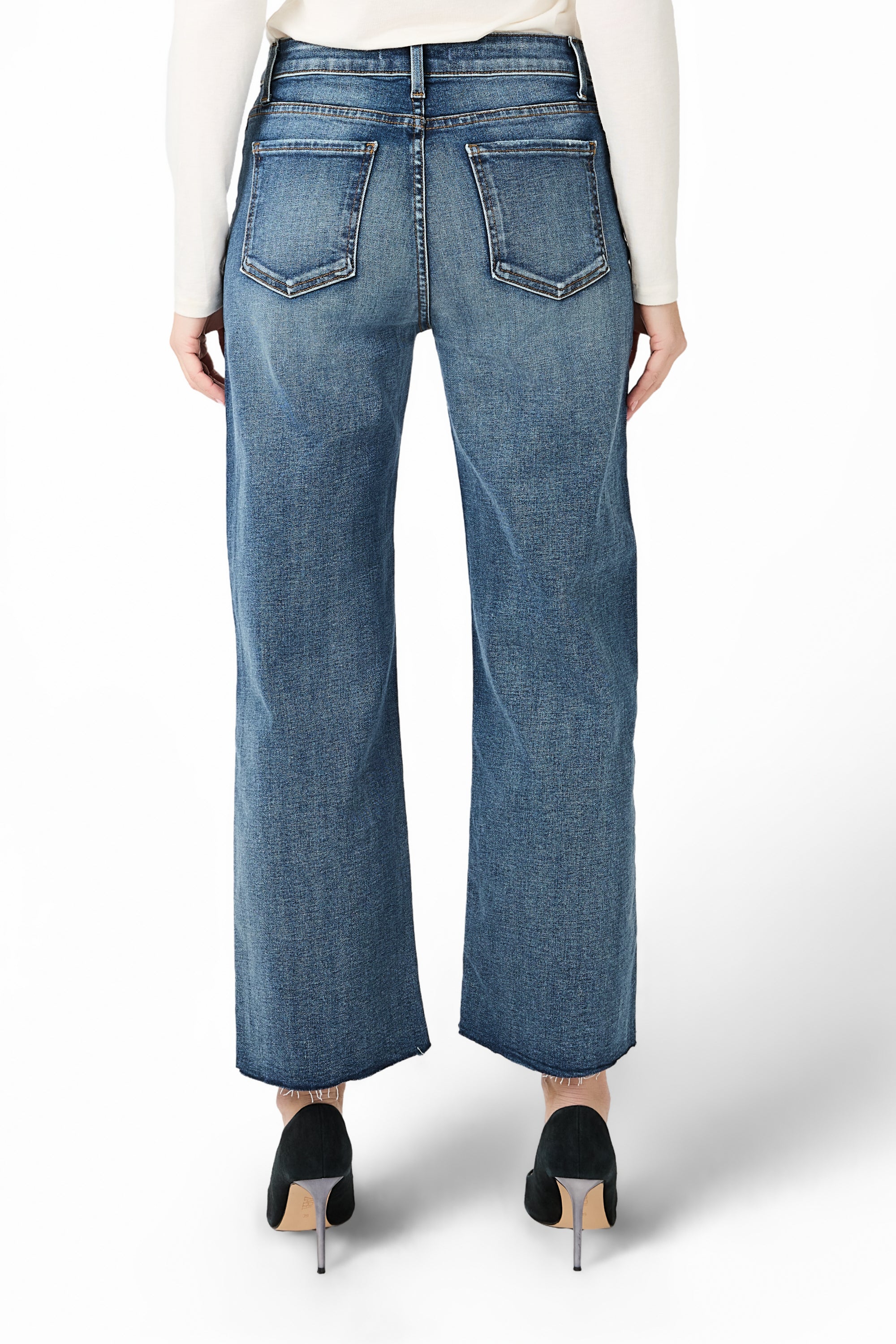 Gently sand-washed medium dark denim - high-waisted and cropped at the ankle. The  Hyacinth cu Jean by Fidelity Denim. 