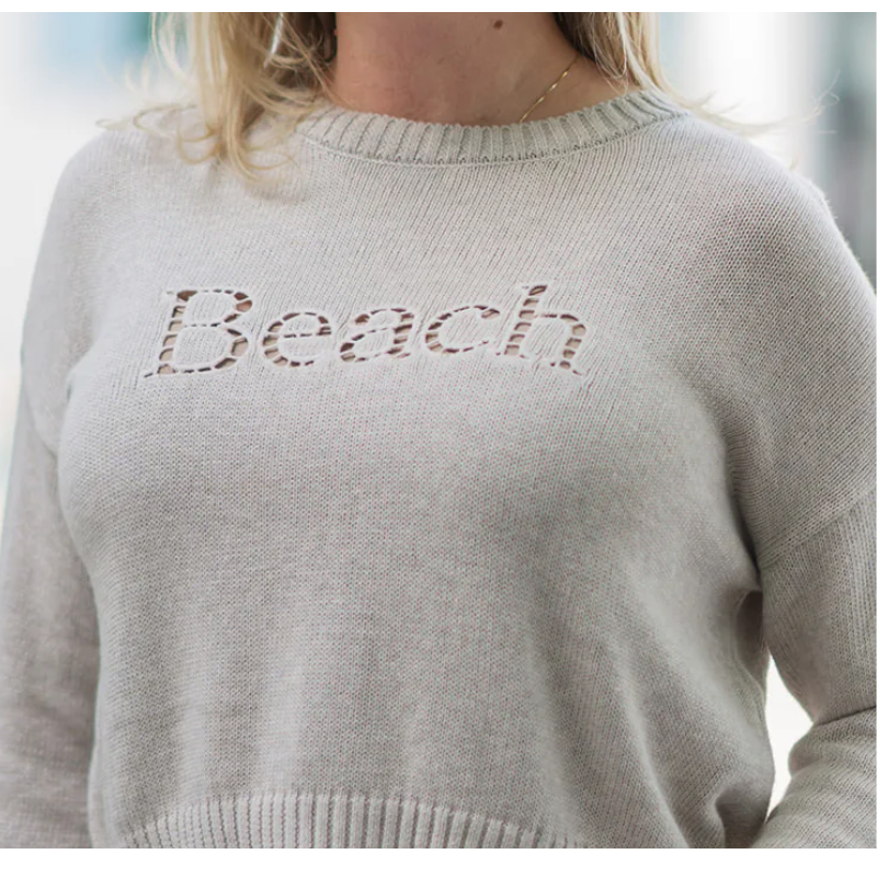 Natural colored lightweight crewneck sweater with Beach  embriodered on front 