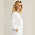 Reset sweatshirt in white cotton side view -shows length where it hits at the waist, 