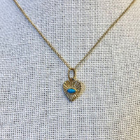 https://hickoxjewelers.com/products/zahava-heirlooms-mini-turquoise-sunbeam-heart-necklace