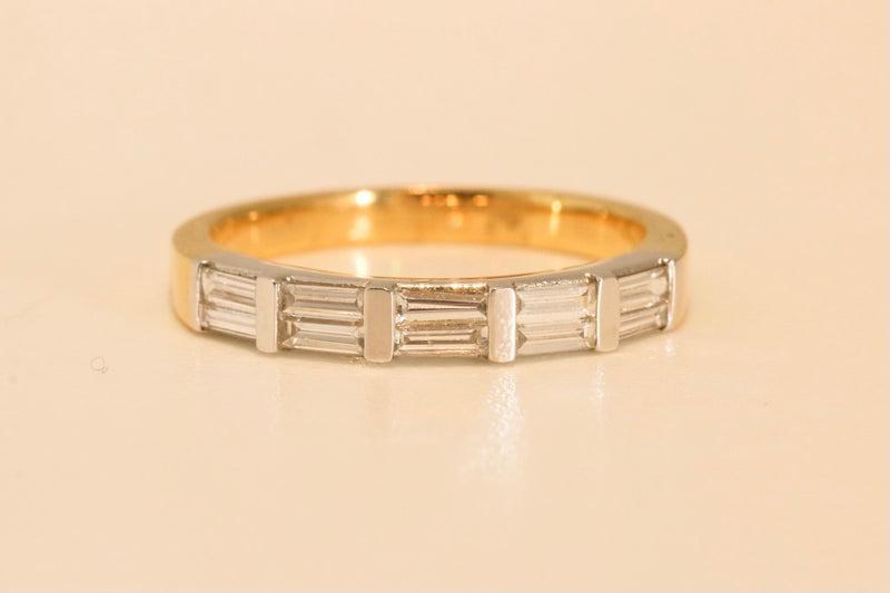 Ring with a double row of Diamond baguettes set in 18kt yellow gold