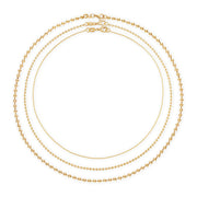A stack of 3 18k gold filled ball chain necklaces in varying lengths  and Ball sizes- 1.5 mm, 3mm, 4mm. 